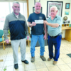 STEPPING UP - Security Bank of the Ozarks’ Jeff Williams (left) and Brad
Williams (right) present a $10,000 donation to the Eminence Area Volunteer Fire
Department Chief Jim Bay to help the Department recover from the March 5 fire.